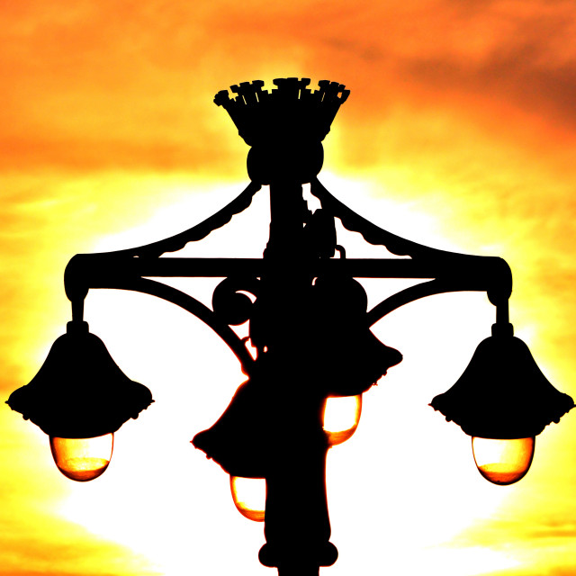 "A street lamp in the sunset" by Amit Mendelsohn - £50.00 "A street lamp in the sunset" stock image