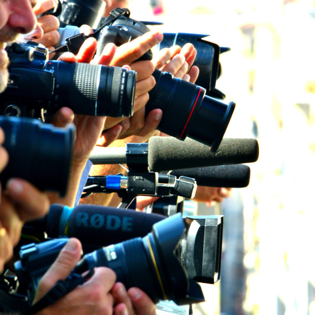 "Photojournalists in action" by Amit Mendelsohn - £50.00 "Photojournalists in action" stock image