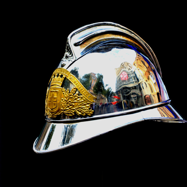 "An old firemen helmet" stock image