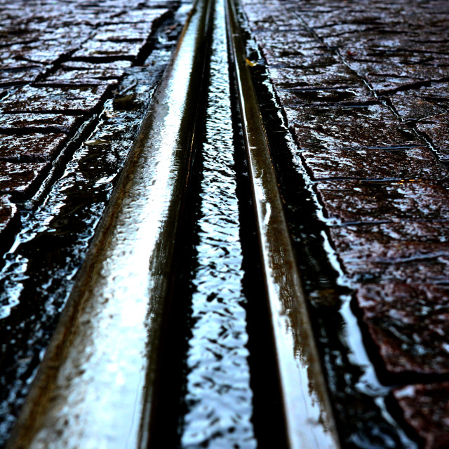 "A rail with water streaming in it" by Amit Mendelsohn - £50.00 "A rail with water streaming in it" stock image