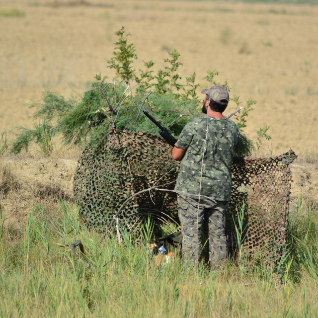 "A hunter behind his cover" by Amit Mendelsohn - £50.00 "A hunter behind his cover" stock image