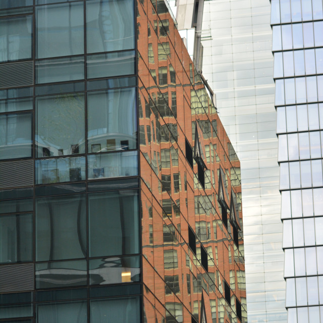 "A reflection on a single façade" by Amit Mendelsohn - £50.00 "A reflection on a single façade" stock image