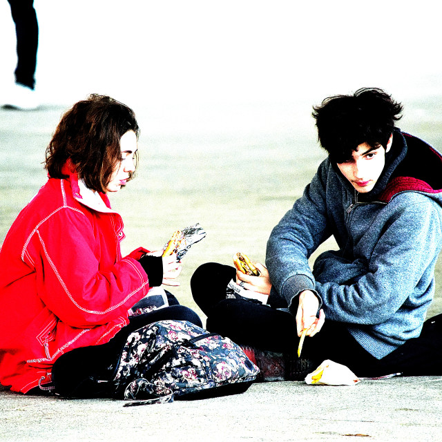 "A couple eating on the port" by Amit Mendelsohn - £50.00 "A couple eating on the port" stock image
