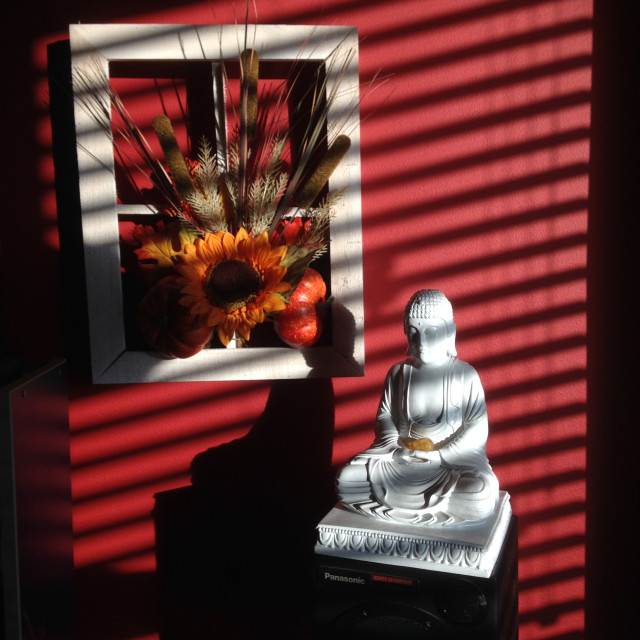 "A Small Buddha in the Sunlight" stock image