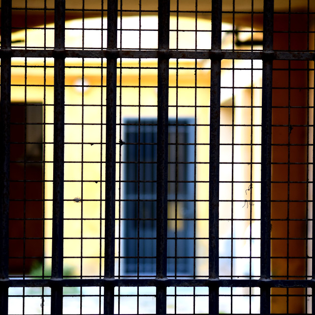 "Behind bars" stock image