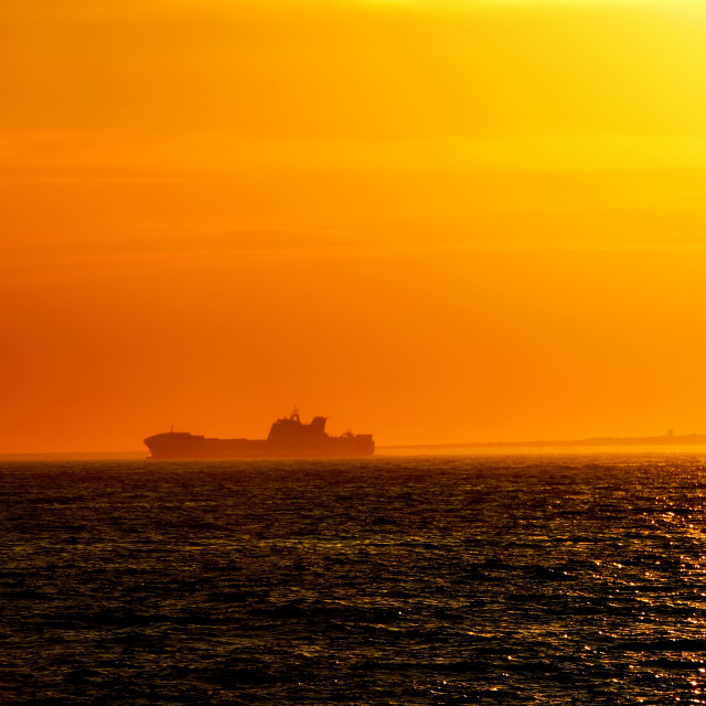 "A boat in the horizon" stock image