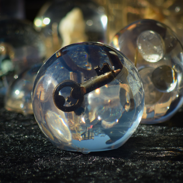 "A key in a crystal ball" stock image