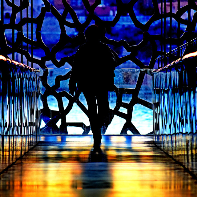 "A man walking the Mucem corridor" by Amit Mendelsohn - £50.00 "A man walking the Mucem corridor" stock image