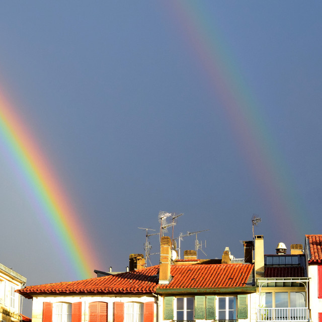 "A double rainbow in the sky" stock image