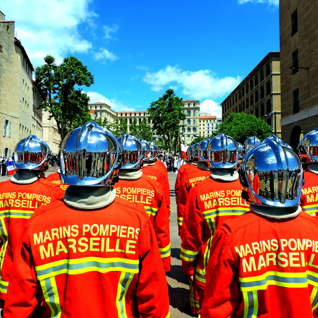 "The firemen receiving their helmets" by Amit Mendelsohn - £50.00 "The firemen receiving their helmets" stock image