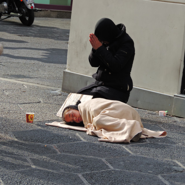 "A mother begging for food" by Amit Mendelsohn - £50.00 "A mother begging for food" stock image