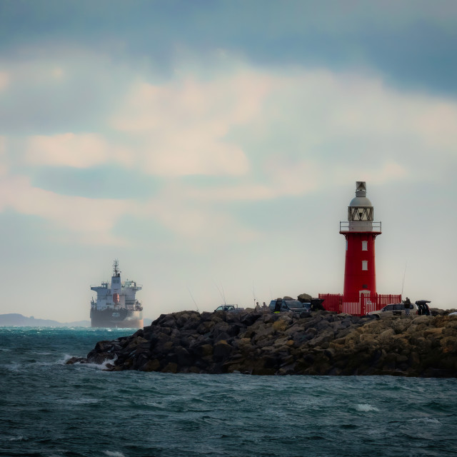 "North Mole Lighthouse with Ship" stock image