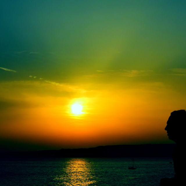 "A man in the sunset" by Amit Mendelsohn - $48.79 "A man in the sunset" stock image