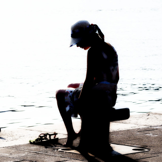 "A girl in front of the water" stock image