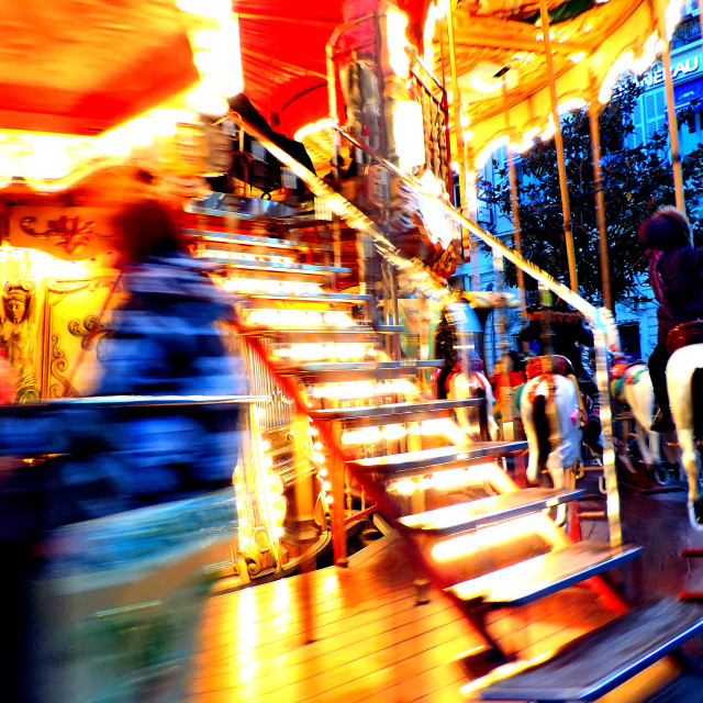 "Light and the merry go round" stock image