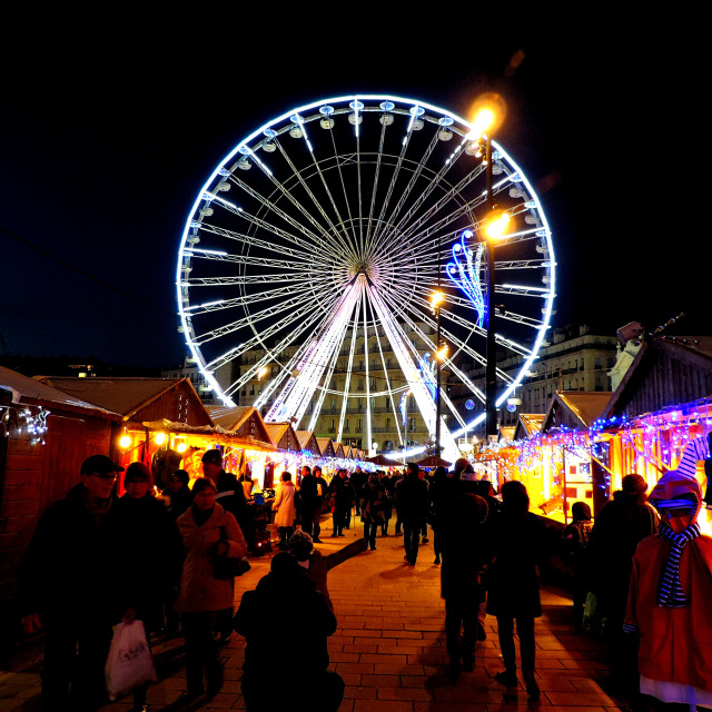 "The big wheel dominating the market" by Amit Mendelsohn - £50.00 "The big wheel dominating the market" stock image
