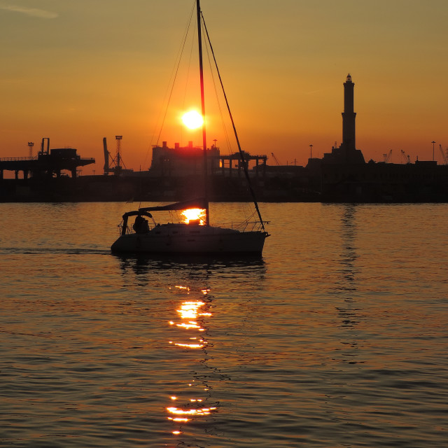 "A boat in the sunset" stock image