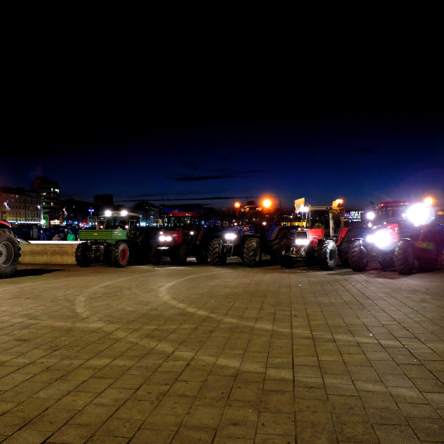 "Tractors on the port at night" stock image