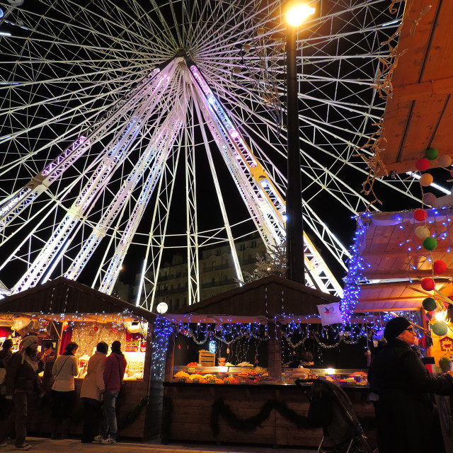 "The wheel dominate the xmas market" by Amit Mendelsohn - £50.00 "The wheel dominate the xmas market" stock image
