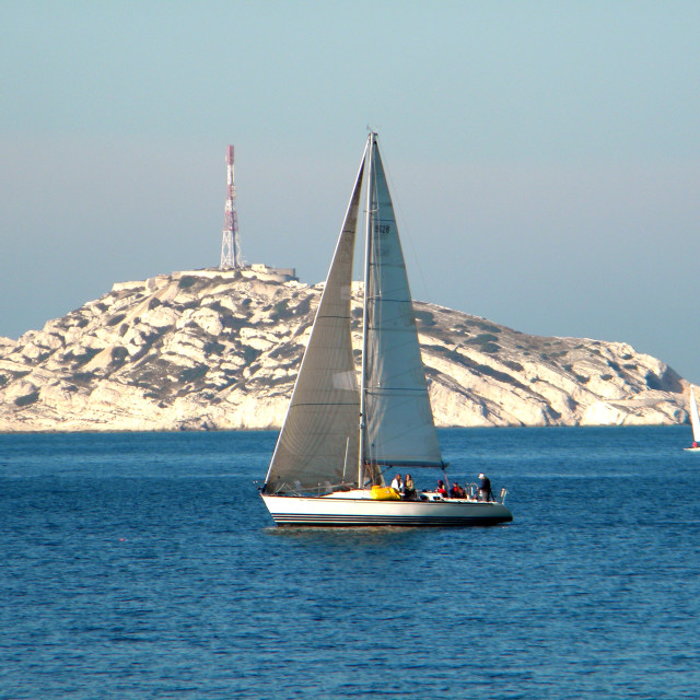 "A sail boat in front of the islands" by Amit Mendelsohn - £50.00 "A sail boat in front of the islands" stock image