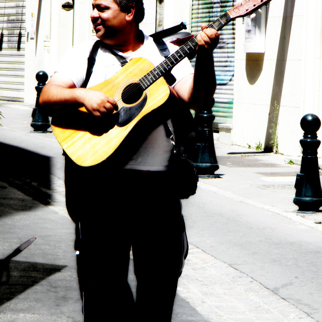 "Aix en provence - the happy musician" by Amit Mendelsohn - £50.00 "Aix en provence - the happy musician" stock image