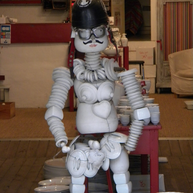 "A man made of dishes and cups" by Amit Mendelsohn - £50.00 "A man made of dishes and cups" stock image