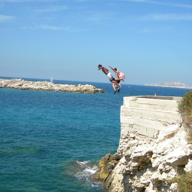 "Jumping off the cliff" stock image