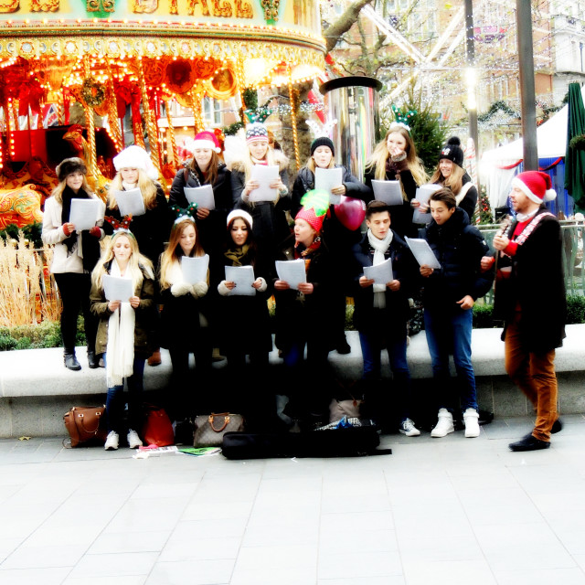 "A band singing Christmas songs" stock image