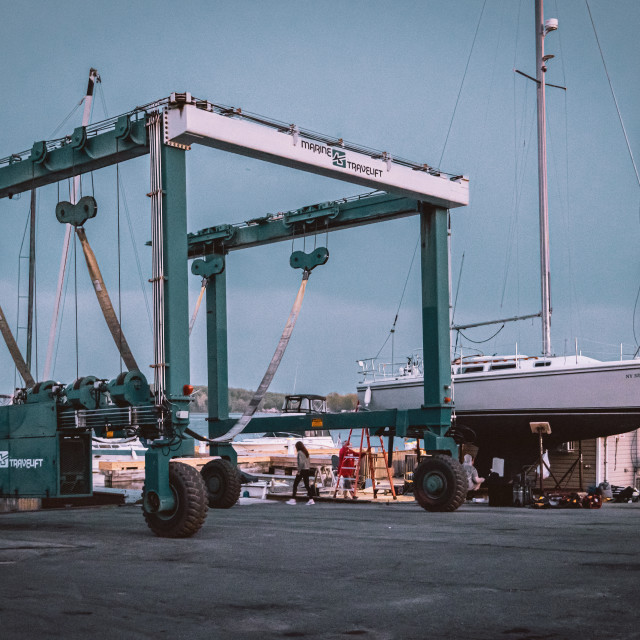 "Northwind Harbor Crane Dusk" stock image