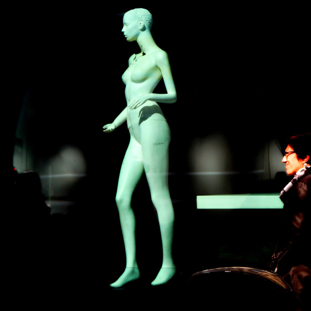 "A mannequin followed by a woman" by Amit Mendelsohn - $60.98 "A mannequin followed by a woman" stock image