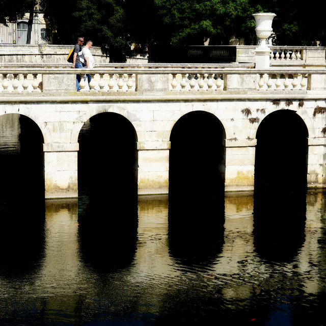 "Nimes, bridge over the canal" by Amit Mendelsohn - £50.00 "Nimes, bridge over the canal" stock image