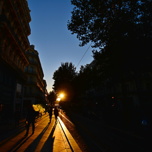 "Silhouette of people in the sunset" stock image