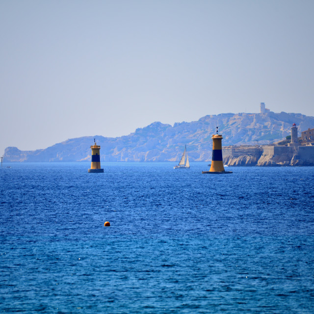 "The sea and two light towers" by Amit Mendelsohn - £50.00 "The sea and two light towers" stock image