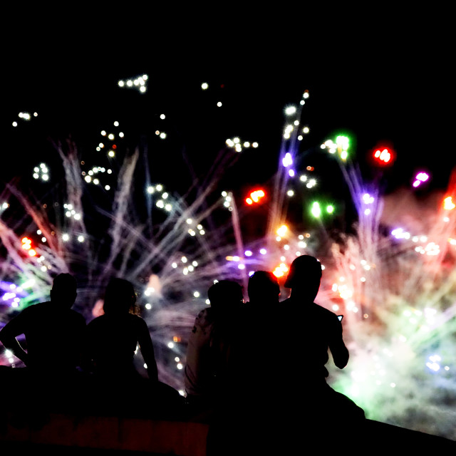 "people watching fireworks" by Amit Mendelsohn - £50.00 "people watching fireworks" stock image