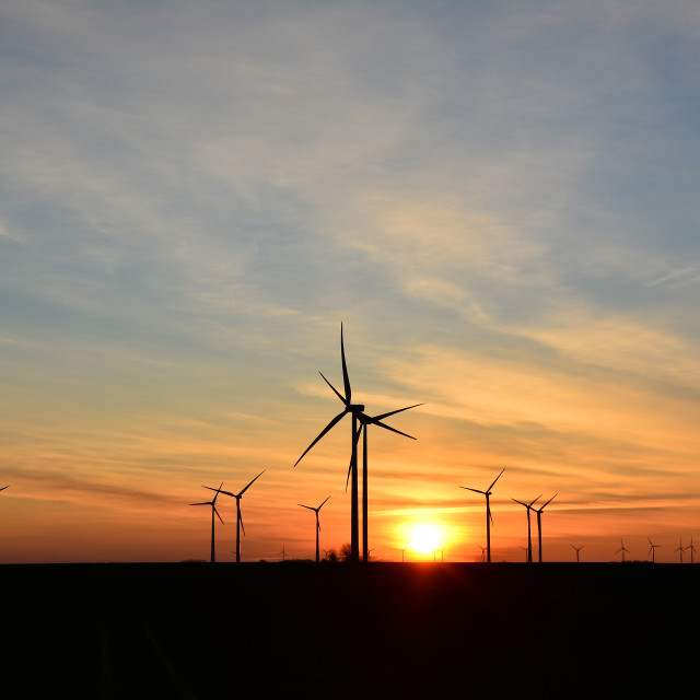 "Wind turbine in the sunset" stock image