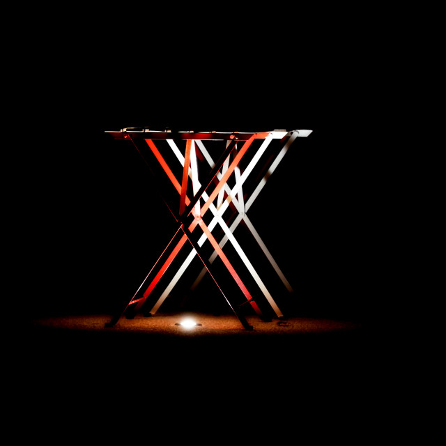 "Tables under projection" by Amit Mendelsohn - $62.97 "Tables under projection" stock image