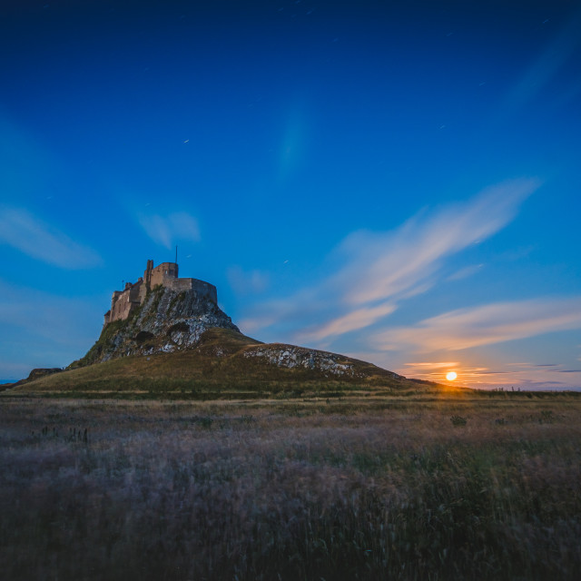 "The Supermoon over Lindisfarne Castle, Northumberland" stock image