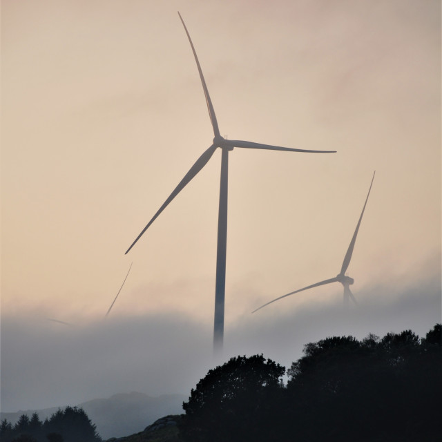 "Windmill in Cloud at Dusk" stock image