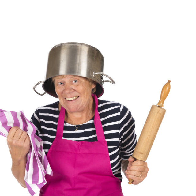 "Funny elder woman with apron and pin roller" stock image