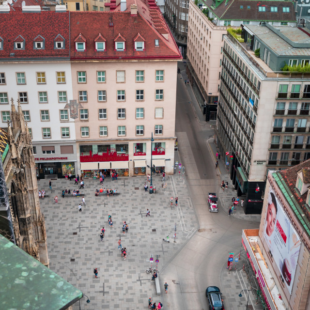 "Panoramic high angle view of Viena downtown and Stephansplatz from Stephansdom, Vienna's cathedral rising above the main city square always busy with tourists and pedestrians" stock image