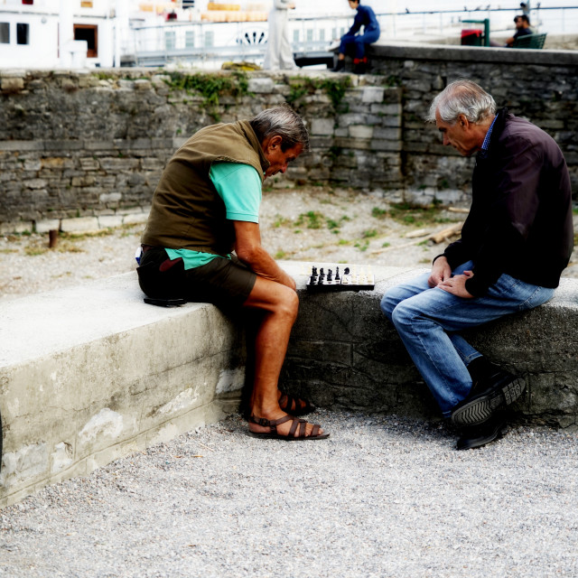 "Playing chess - como promenade" by Amit Mendelsohn - $60.98 "Playing chess - como promenade" stock image