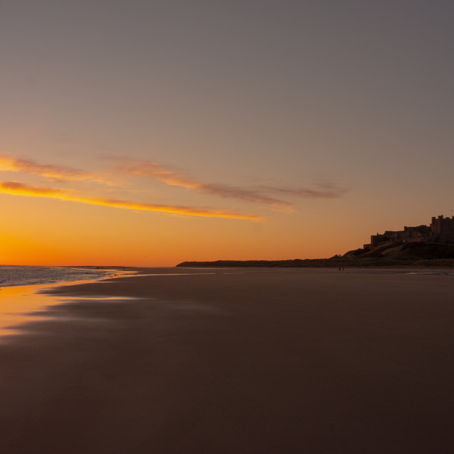 "Bamburgh castle sunrise" stock image