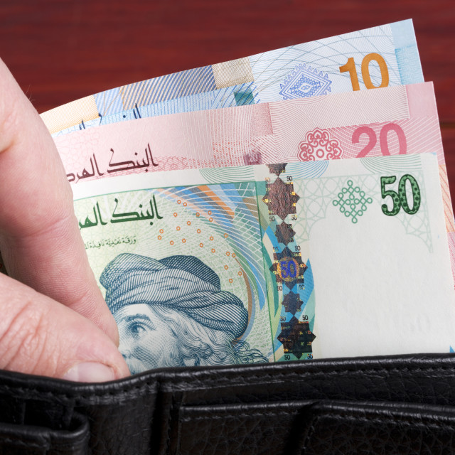"Tunisian money in the black wallet" stock image