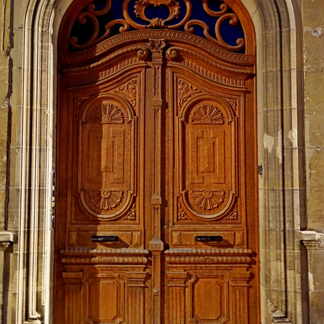 "A carved wooden door" stock image