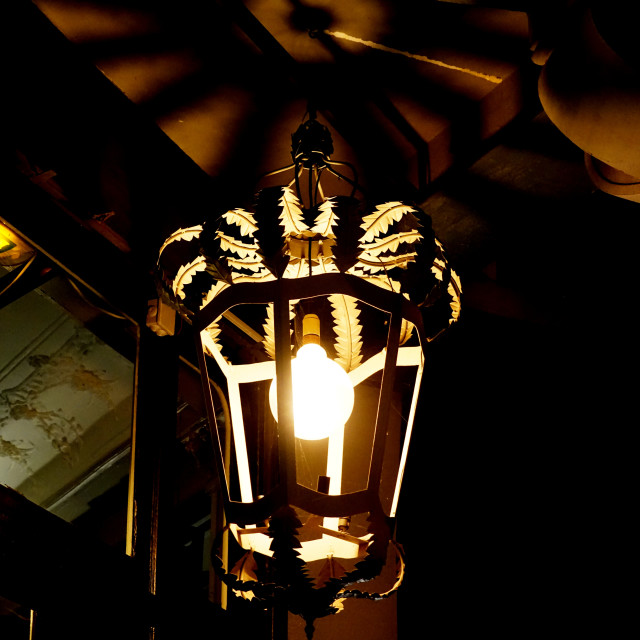 "A lamp in an entrance of a bar" stock image