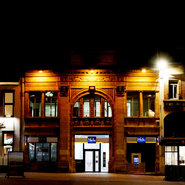 "A bank at night in st. quentin" stock image