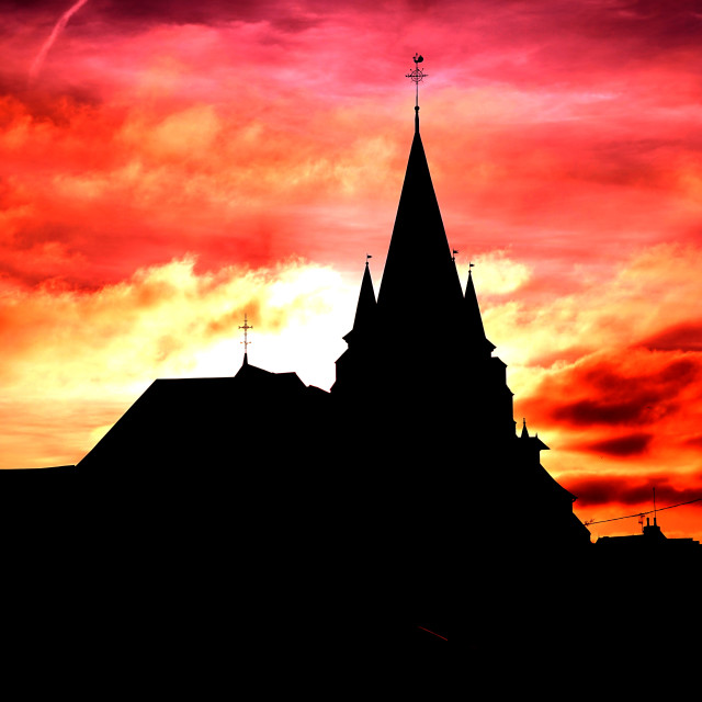 "The church of Vervins in the sunset" stock image