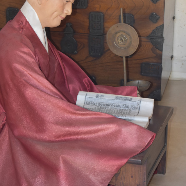 "Man reading at Suwon Hwaseong Fortress, Gyeonggi-do, South Korea" stock image