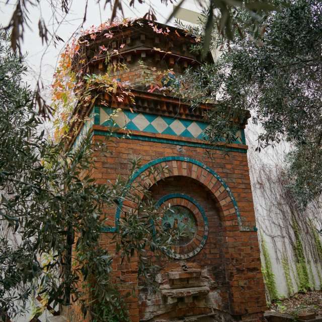 "An old brick fountain" stock image