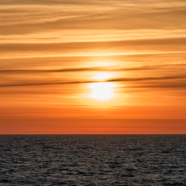 "Serene Sunset at Sea" by Carlos A Esquivel - $18.20 "Serene Sunset at Sea" stock image